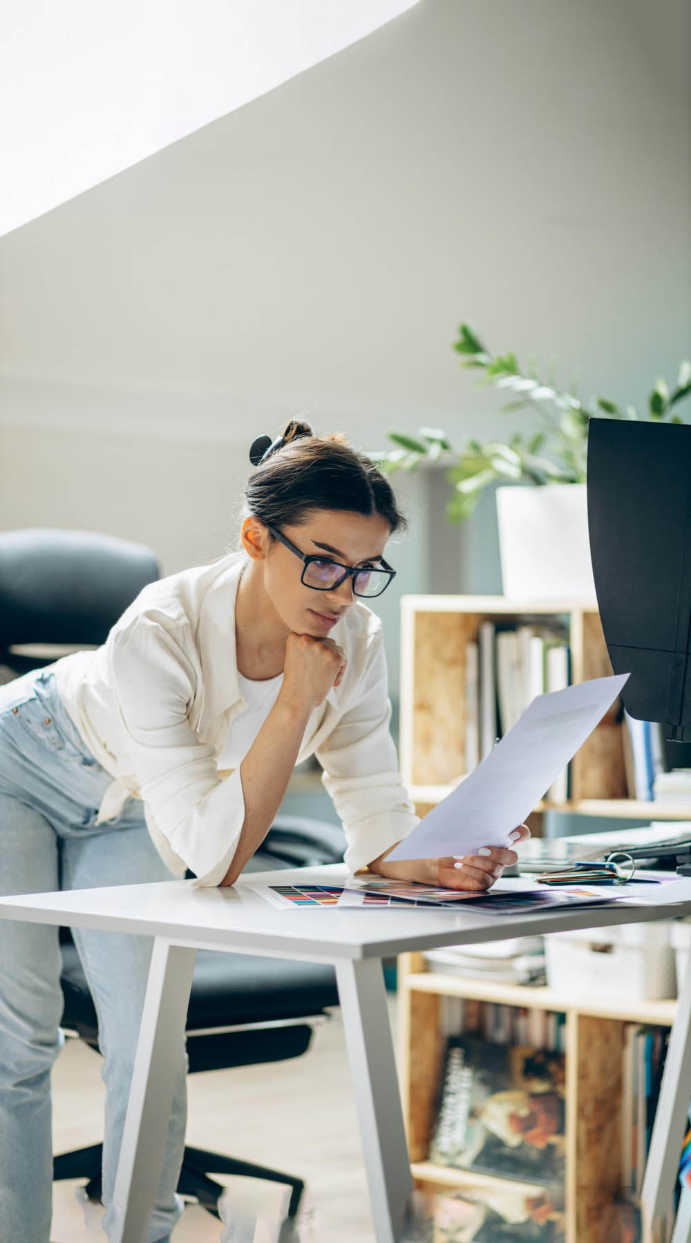 Female business owner reading through risk assessment template