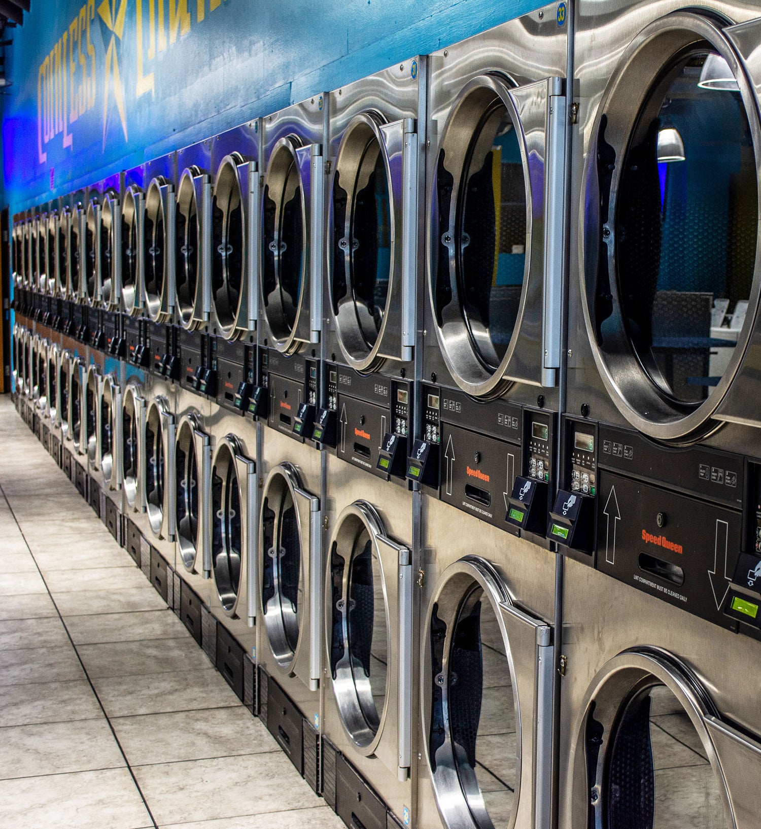Dry cleaned shirts on hangers in dry cleaning business.