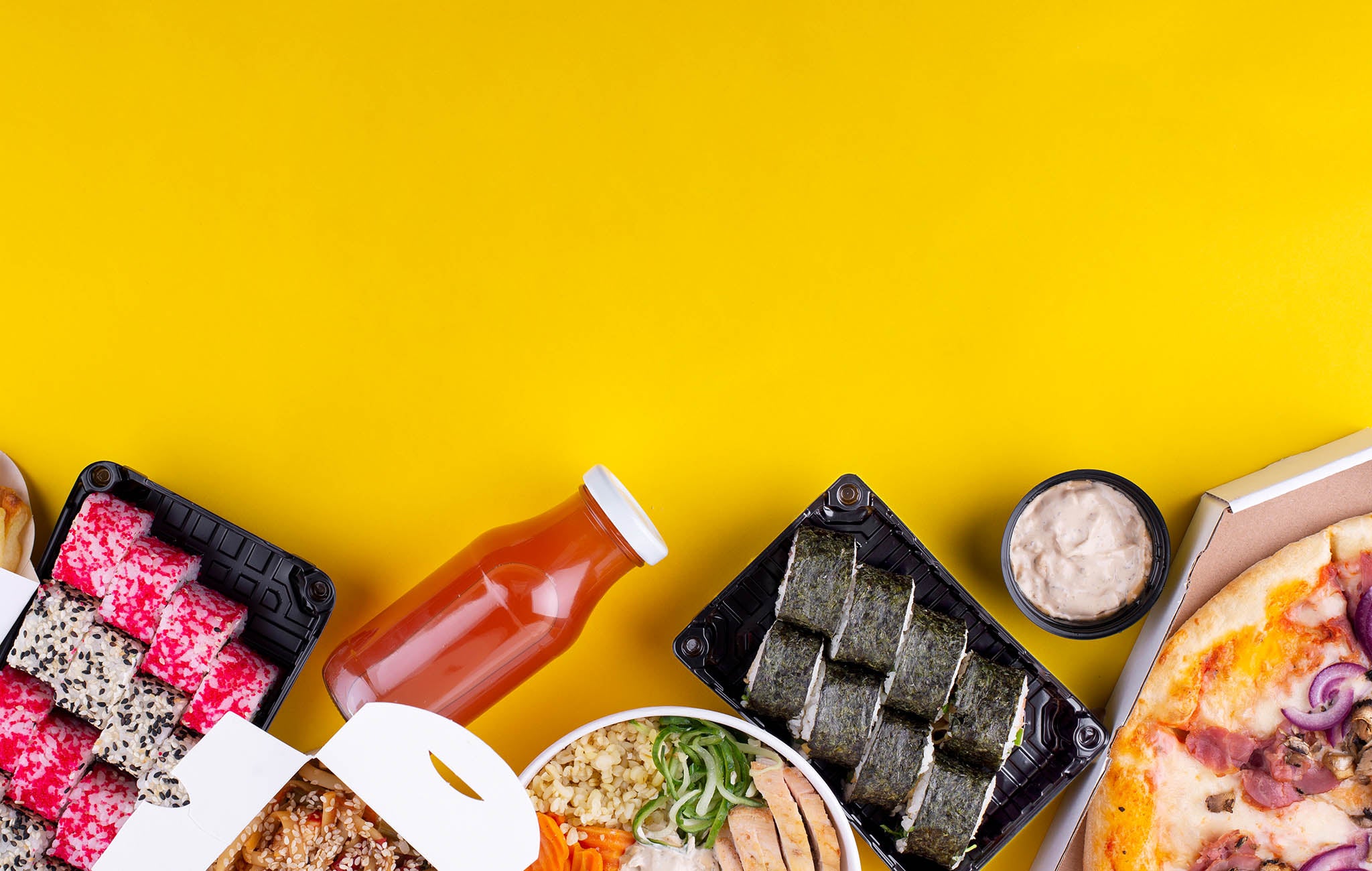 A selection of takeaway food and drink from a takeaway restaurant.
