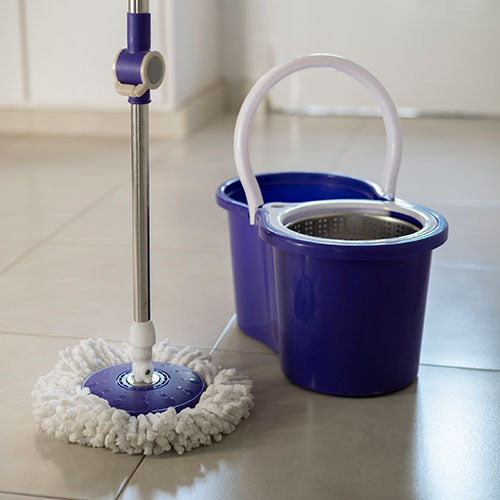 Mop and bucket for cleaning floor in fish and chip shop.