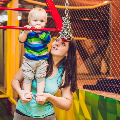Child being supervised in soft play centre