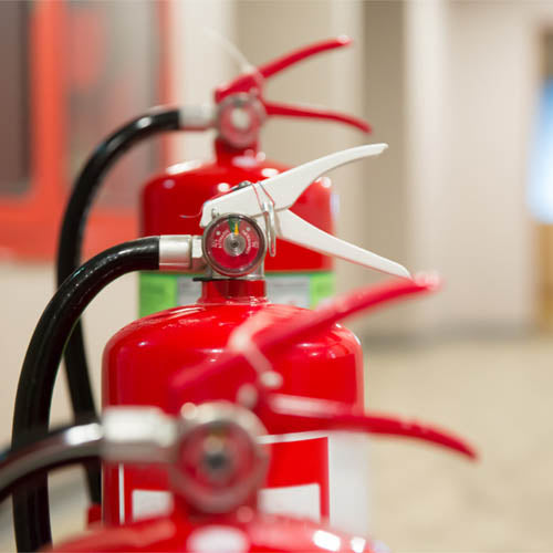 Red-fire-extinguishers-in-small-business